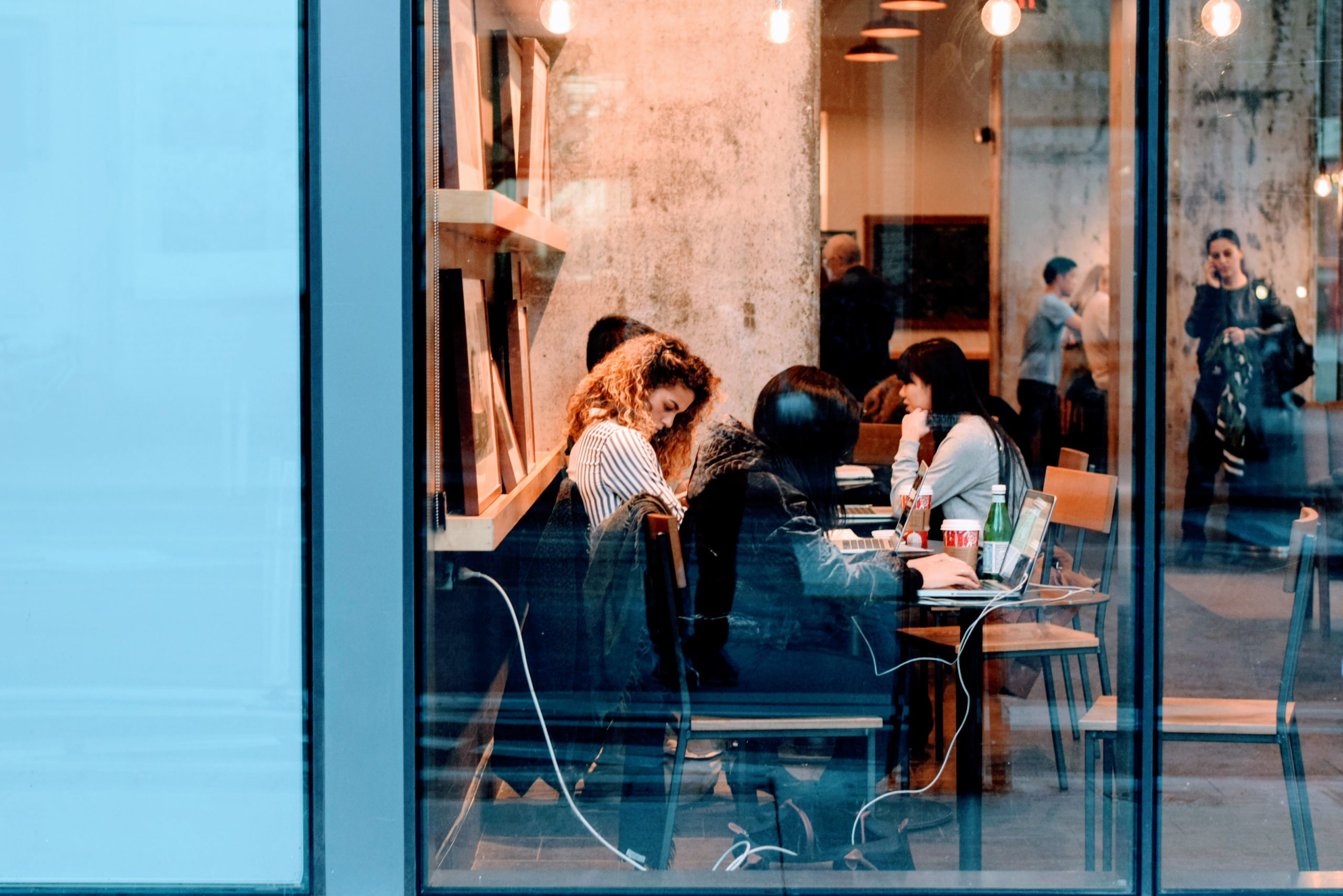 Canva - Friends in A Coffee Shop